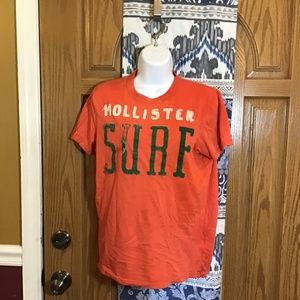💚 3/$25Hollister mens size S orange shirt with white and green lettering